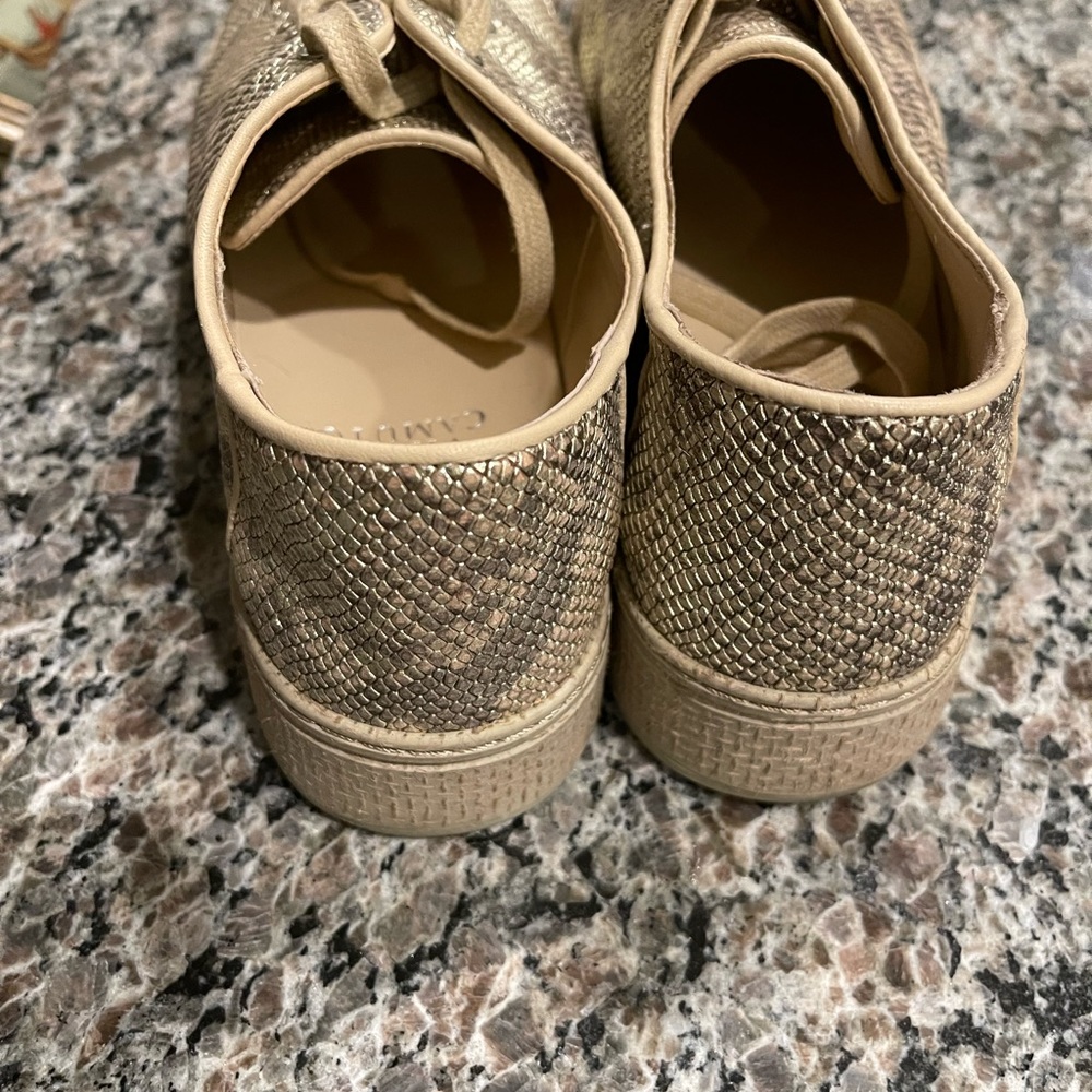 Vince Camuto tennis shoes worn twice in excellent condition.
